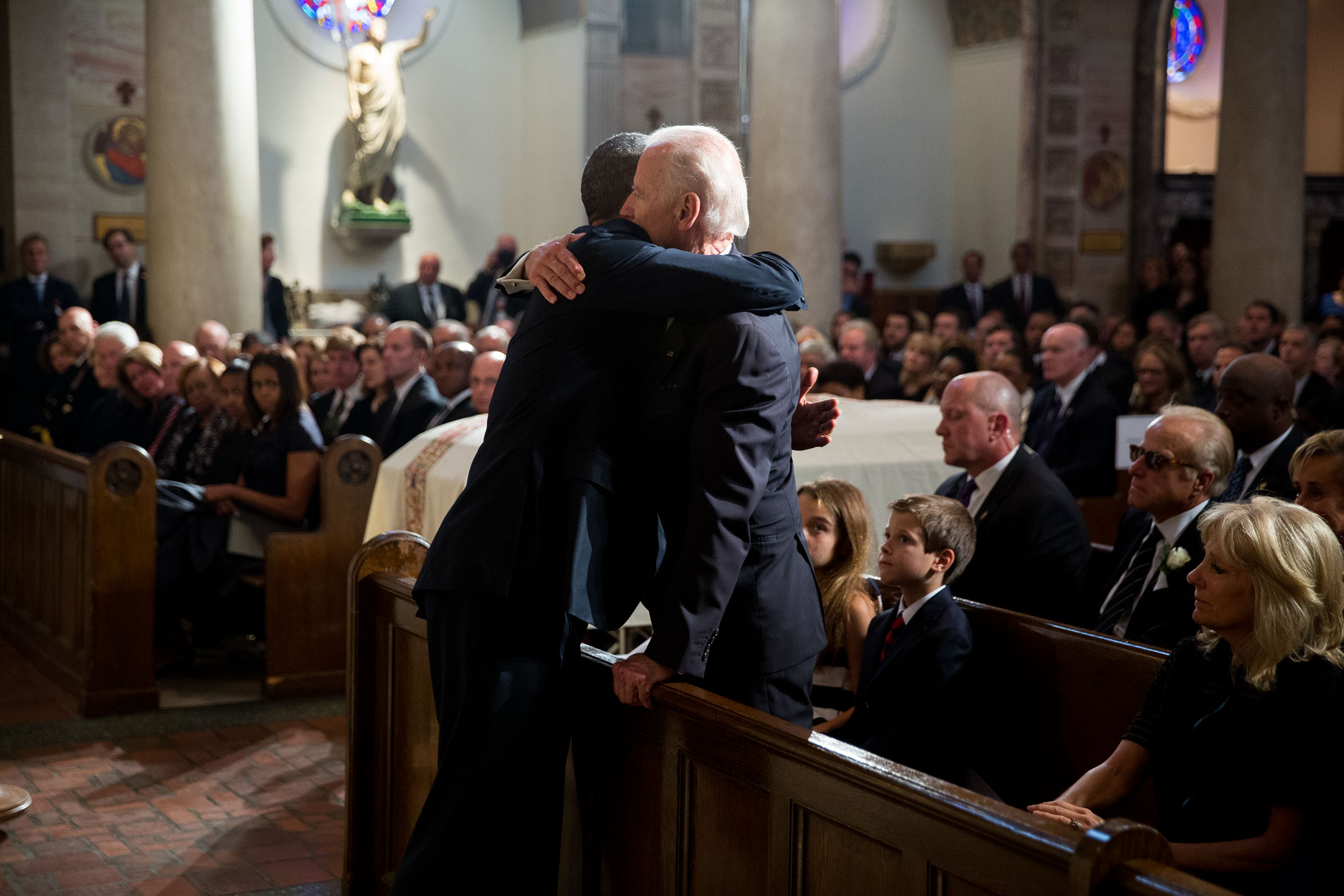 people at funeral in a church